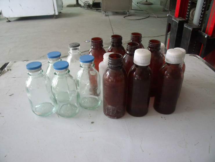 powder filling capping machines Flaschen zum Befüllen der Verschließmaschine.jpg