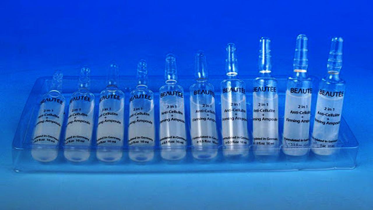 liquid solution bottles labeling machine samples final products Ampullenflaschen.jpg